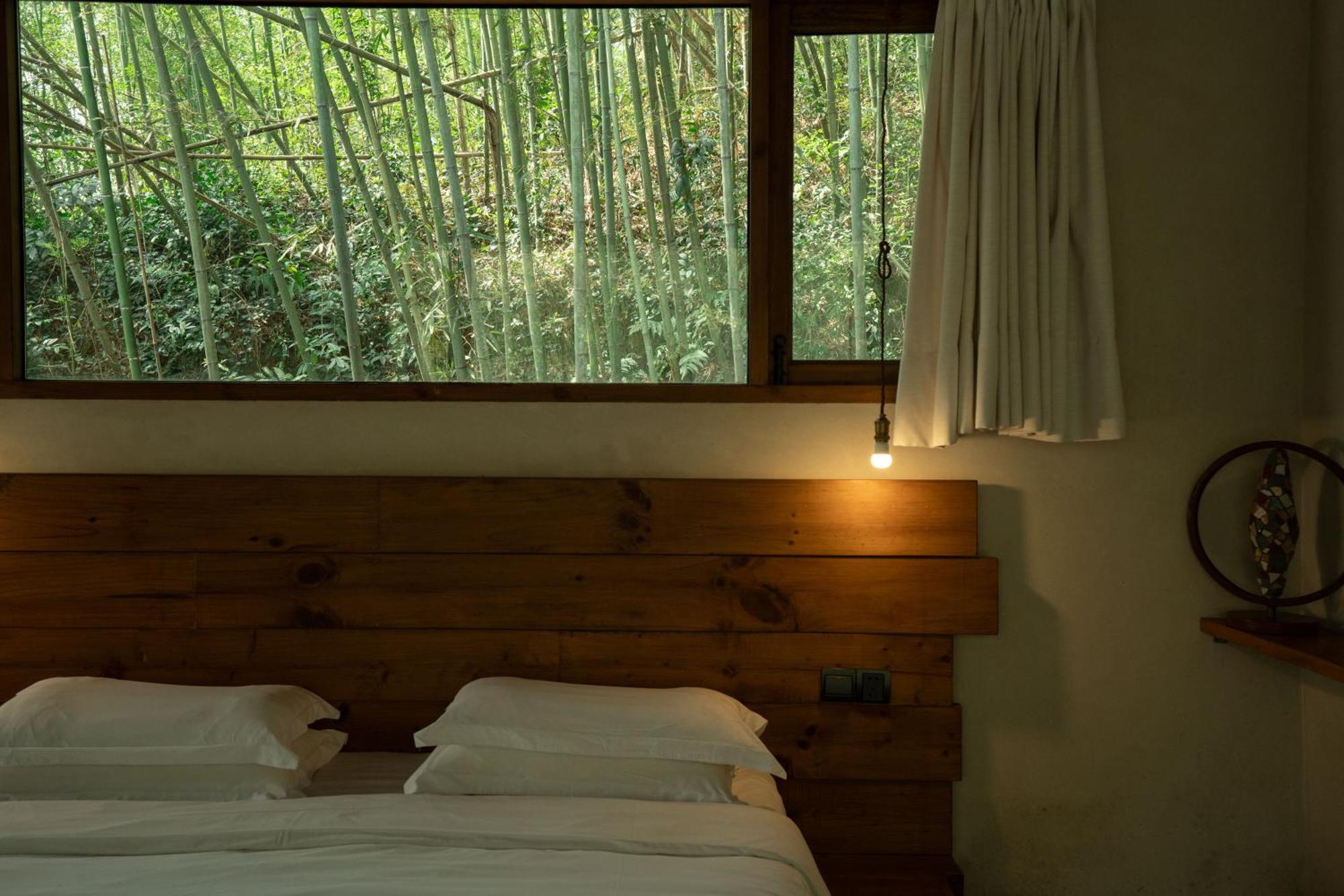 July Bamboo Hostel Deqing Exteriör bild